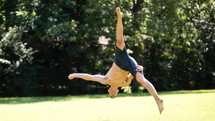 Performing an inverted aerial jump