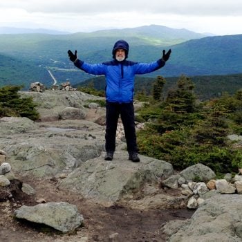 man succeeds in hiking in the wilderness