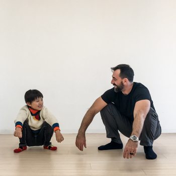 Ryan Hurst teaching his son how to do a squat technique