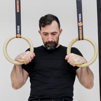 Ryan Hurst demonstrating how to grip gymnastics rings