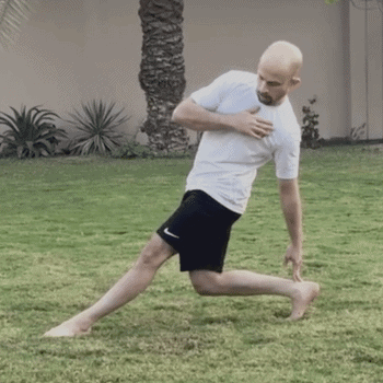 Man Doing Twisting Stretch