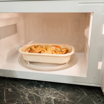 Reheating prepared meals using a microwave