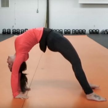 Keira performing a backbend for flexibility