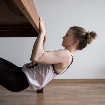 Alicia using the table for inverted rows