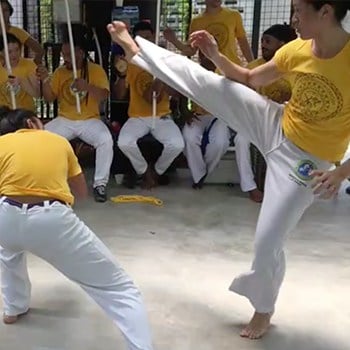 Michelle Ho practicing capoeira