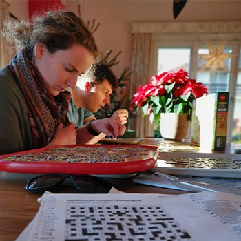 Beth doing a puzzle