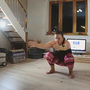 GMB Elements client Vaidė practicing her squat