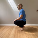 Man Squatting with Heels Up