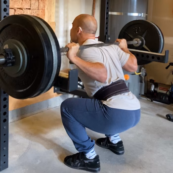 You Can Still Lift Without Breaking Down: How GMB Training Complements Weightlifting 1 man squatting a 300 pound barbell