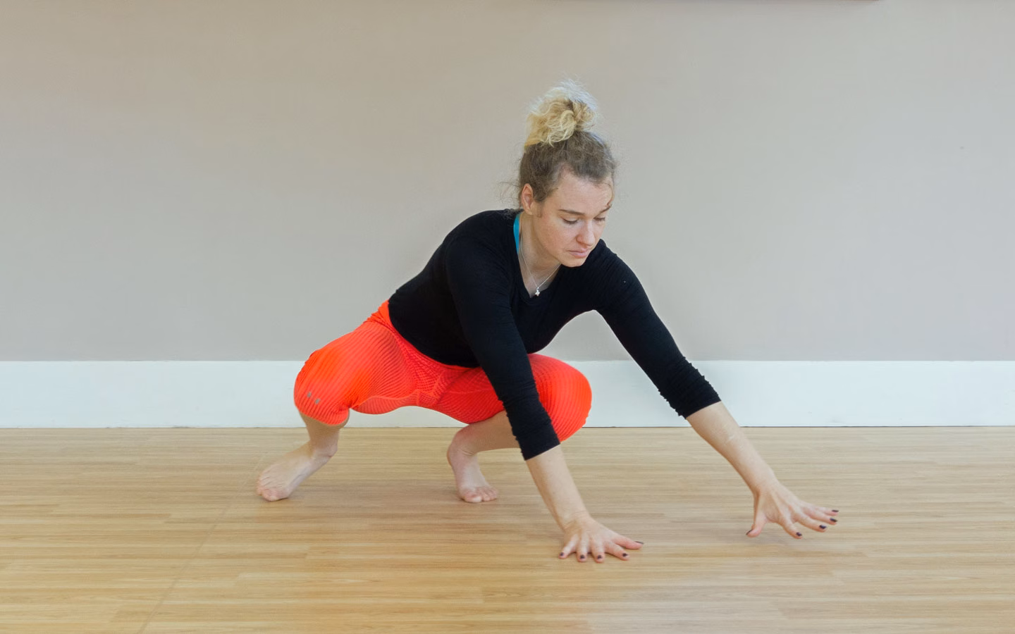 A GMB Trainer demonstrates a version of the Monkey crawl exercise, which is fantastic for beginners.
