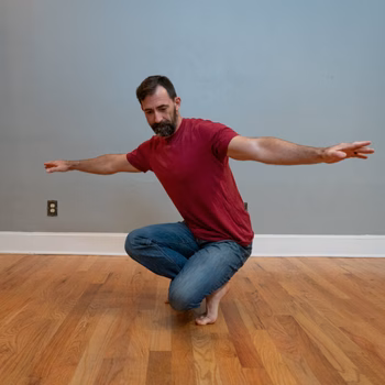 Man getting up off of the floor in the sit to rise test