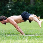 ryan demonstrating a straddle planche hold