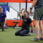 Ryan demonstrating stacked posture in a seated position